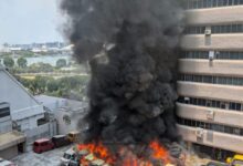 Cars on fire at golden mile tower