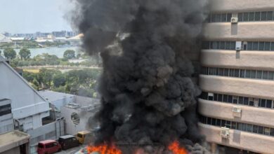 Cars on fire at golden mile tower